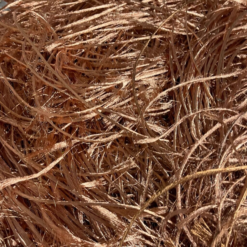 Recovered bare copper wires after removal of insulation from 729 cable wire in Singapore.